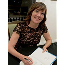 Lynn Cullen prepares to sign a copy of her novel, Twain's End